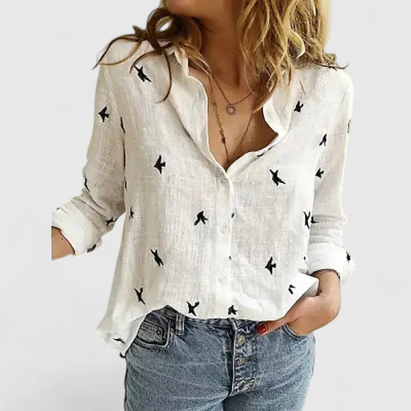 Soft women's floral V-neck long sleeve blouse, a versatile and comfortable fashion top.