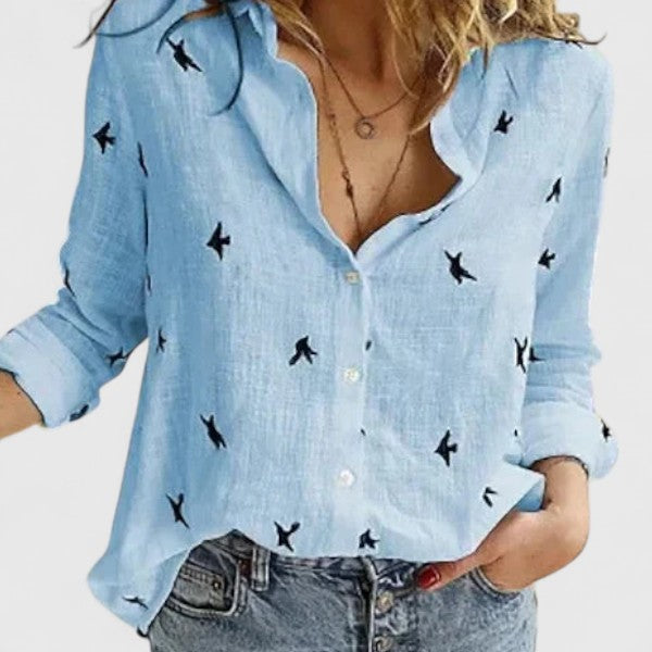Flattering V-neck floral long sleeve blouse for women, suitable for many occasions.