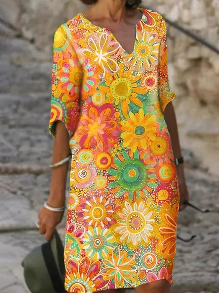 Elegant women's floral V-neck midi dress, perfect for spring occasions or summer fashion. Chic and stylish.