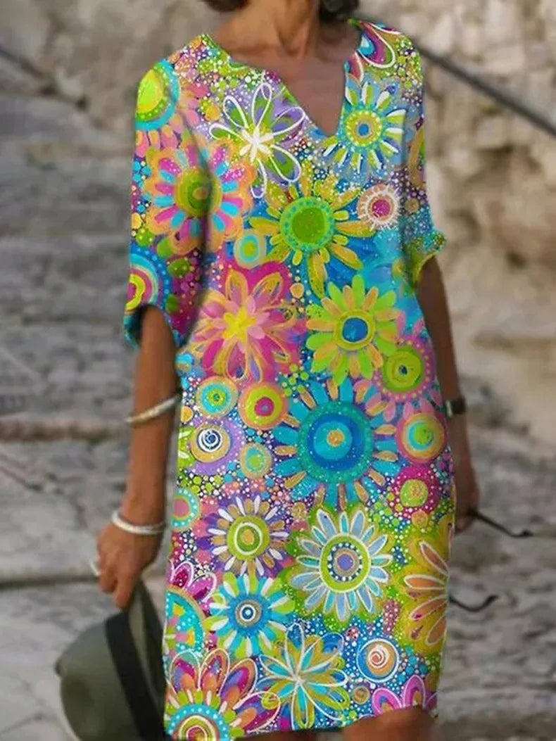 Chic floral V-neck midi dress for women, ideal as a summer, spring, or casual boho dress. Sleeved and elegant.