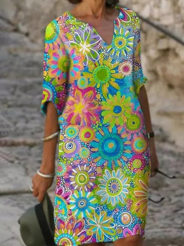Chic floral V-neck midi dress for women, ideal as a summer, spring, or casual boho dress. Sleeved and elegant.