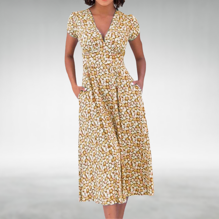 Beautiful women's floral print midi dress featuring a flattering V-neck, comfortable for casual wear.