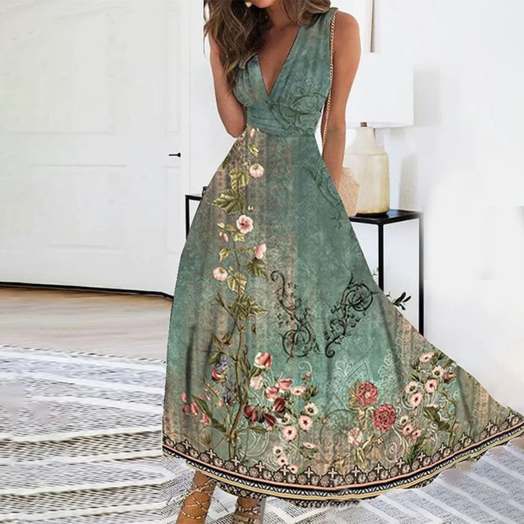 Flowing women's floral maxi dress with V-neck, ideal for wedding guests or elegant summer parties.