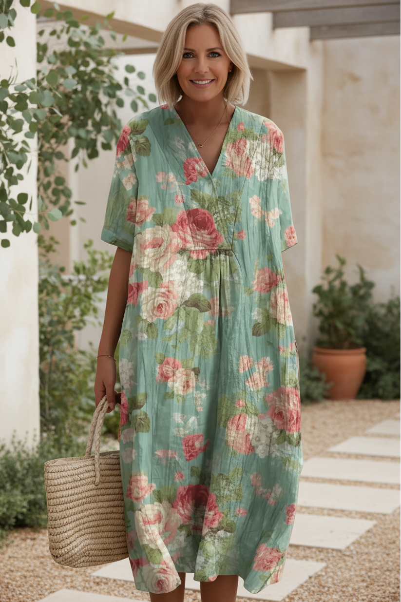 Beautiful floral summer dress with a V-neck and short sleeves, suitable for women's elegant party wear.