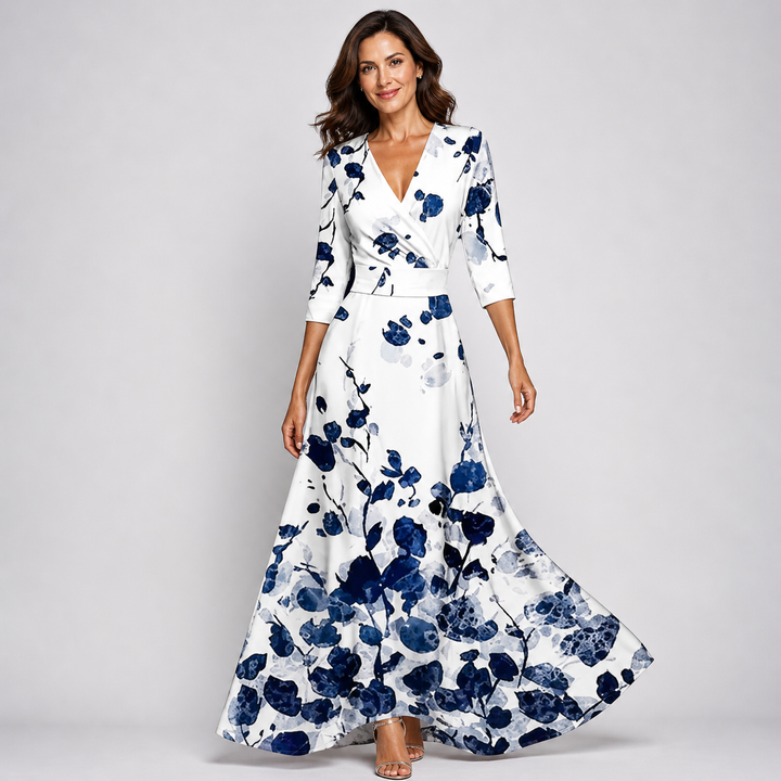 Flowy women's floral wrap maxi dress with V-neck, ideal for elegant summer fashion & vacation occasions.