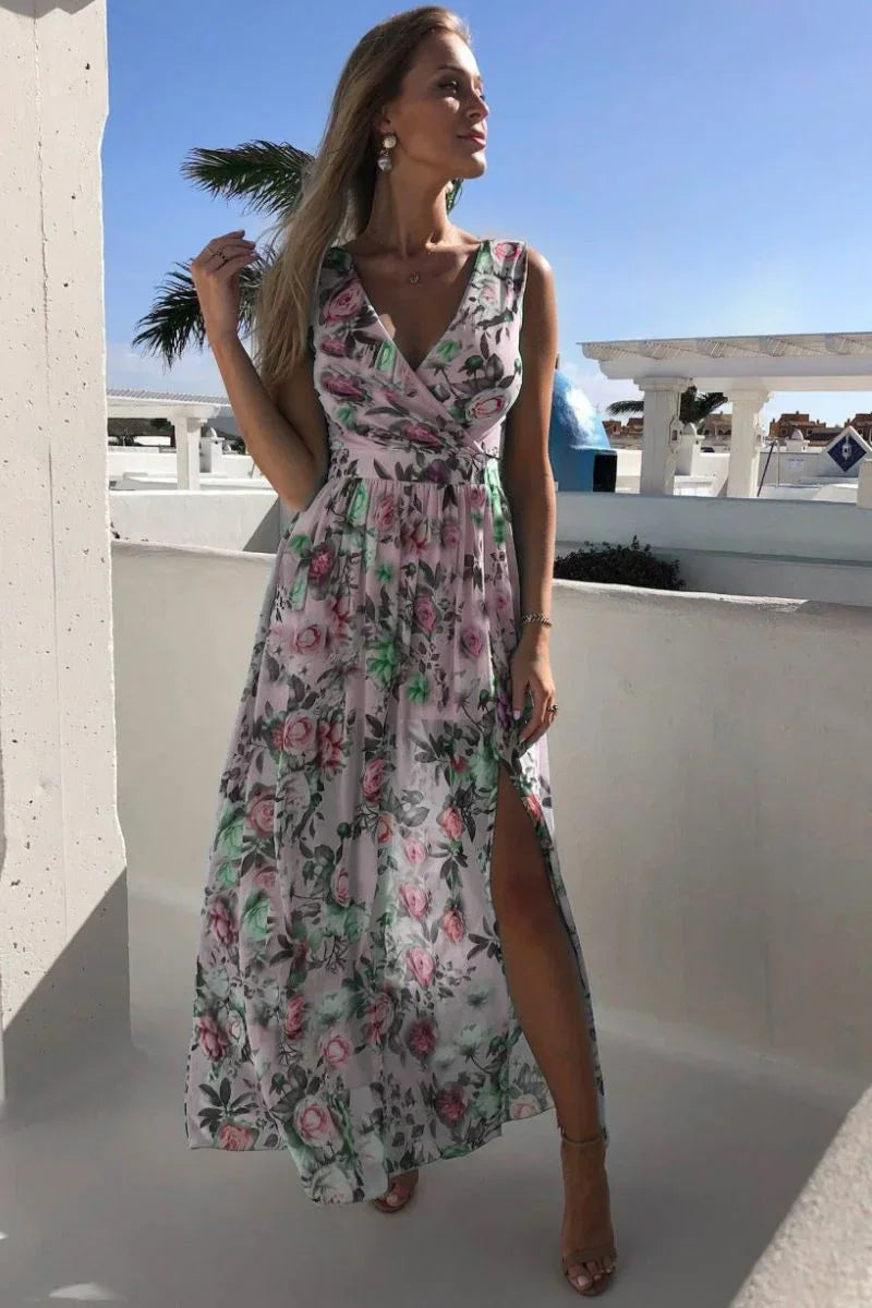 Stylish women's long floral wrap maxi dress. Elegant sleeveless design for summer, beach, or party events.