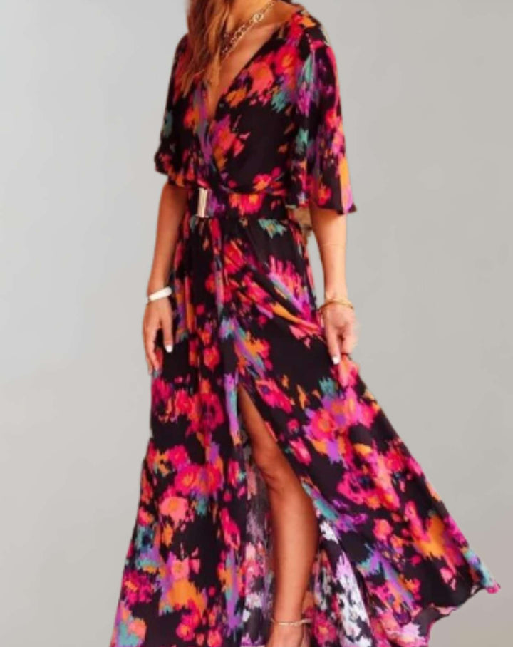 Flowy floral wrap maxi dress for women, with a side slit. Chic summer sundress, ideal for casual or elegant events.