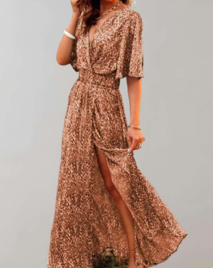 Beautiful floral print women's wrap maxi dress featuring a flattering V-neck and elegant side slit. Perfect summer style.