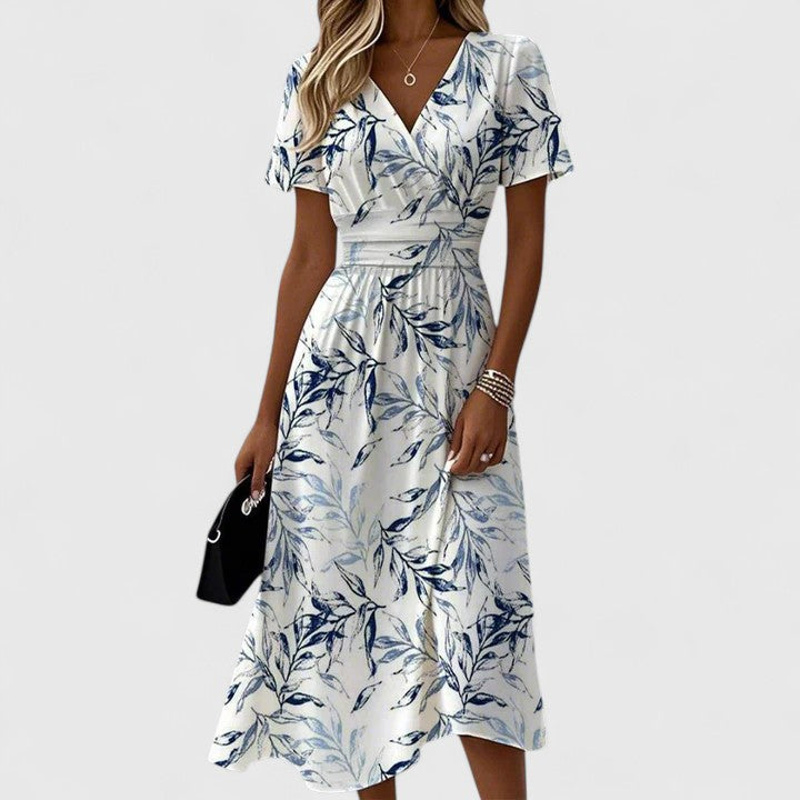 Elegant women's floral wrap midi dress with V-neck, flutter sleeves, and a flowy A-line skirt, perfect for spring/summer.