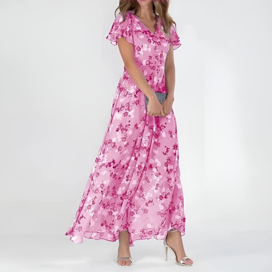 Women's elegant flowing dress, a flattering design offering comfortable and chic style for any summer occasion.