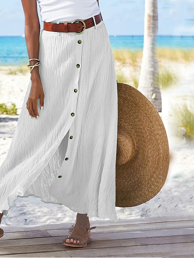 Close-up of the textured linen blend fabric of the elegant long maxi skirt