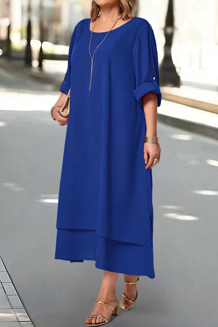Women's elegant flowing maxi dress, ideal sophisticated evening gown for weddings & formal parties.