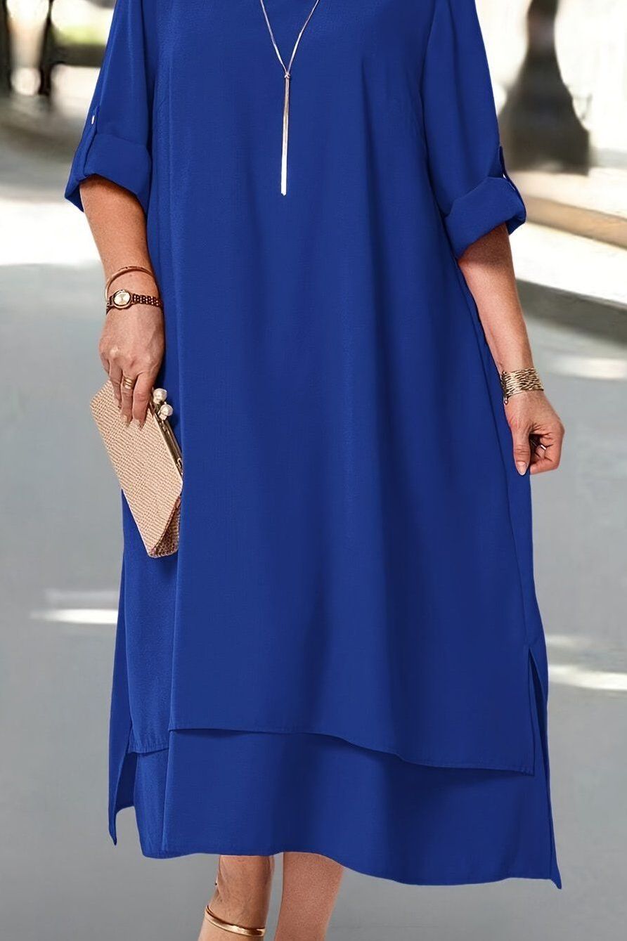 Sophisticated women's flowing maxi dress for formal events. Elegant long evening gown, occasion wear.