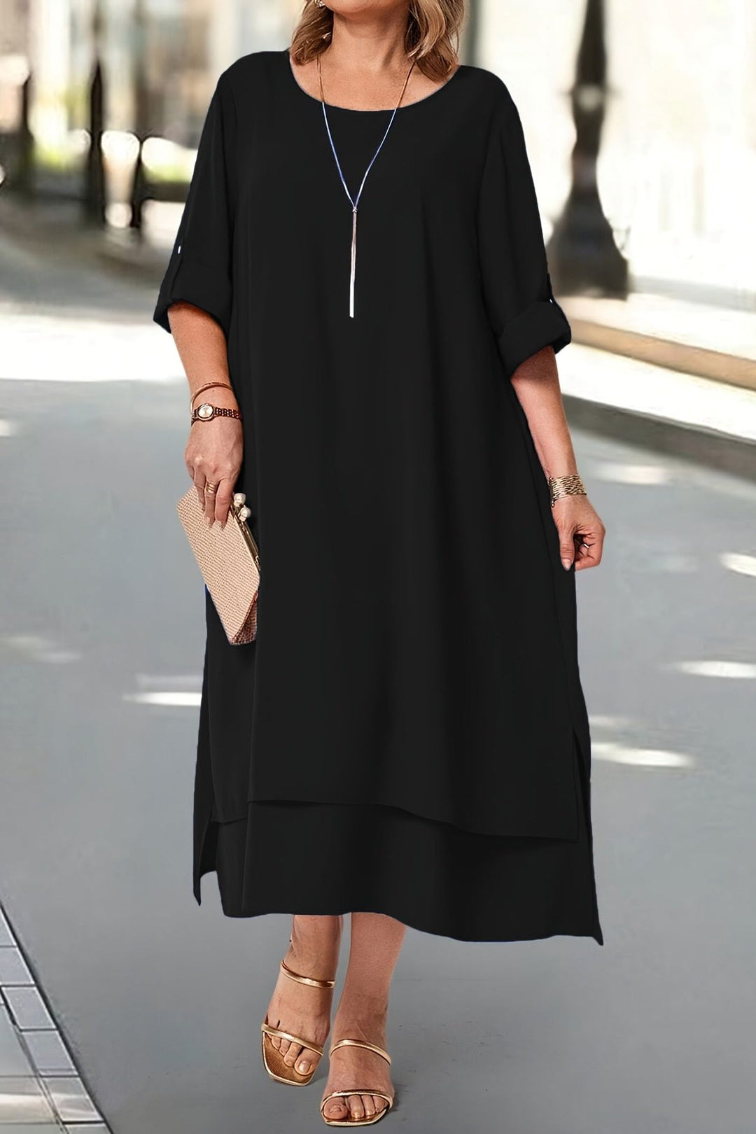 Back view: Women's elegant flowing maxi dress with chic detailing, ideal formal occasion wear.