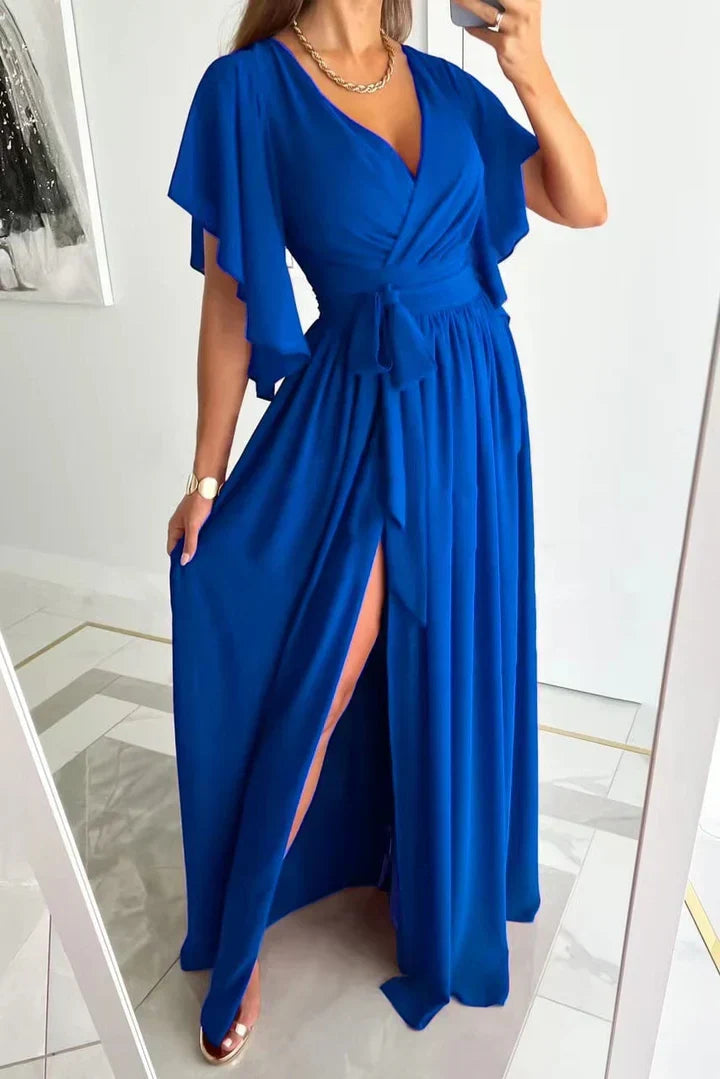 Stylish women's flowing maxi dress with elegant high split, a versatile long dress for summer fashion & beachwear.