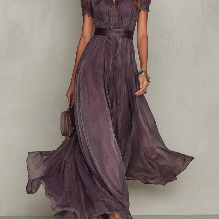 Women's elegant purple maxi dress with intricate lace trim on bodice & hem, perfect formal or evening gown.