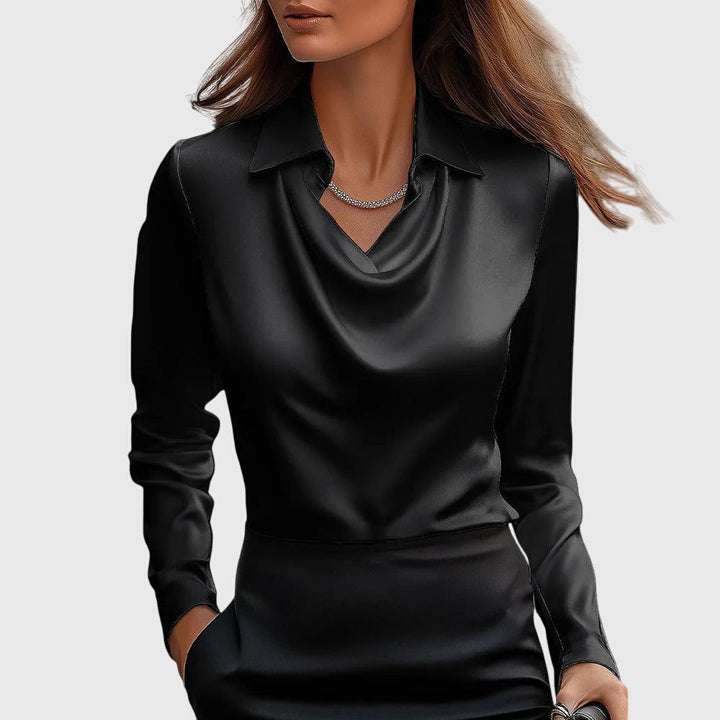 Light blue women's flowy blouse, an elegant & versatile top with a pleated neckline, offering sophisticated comfort.