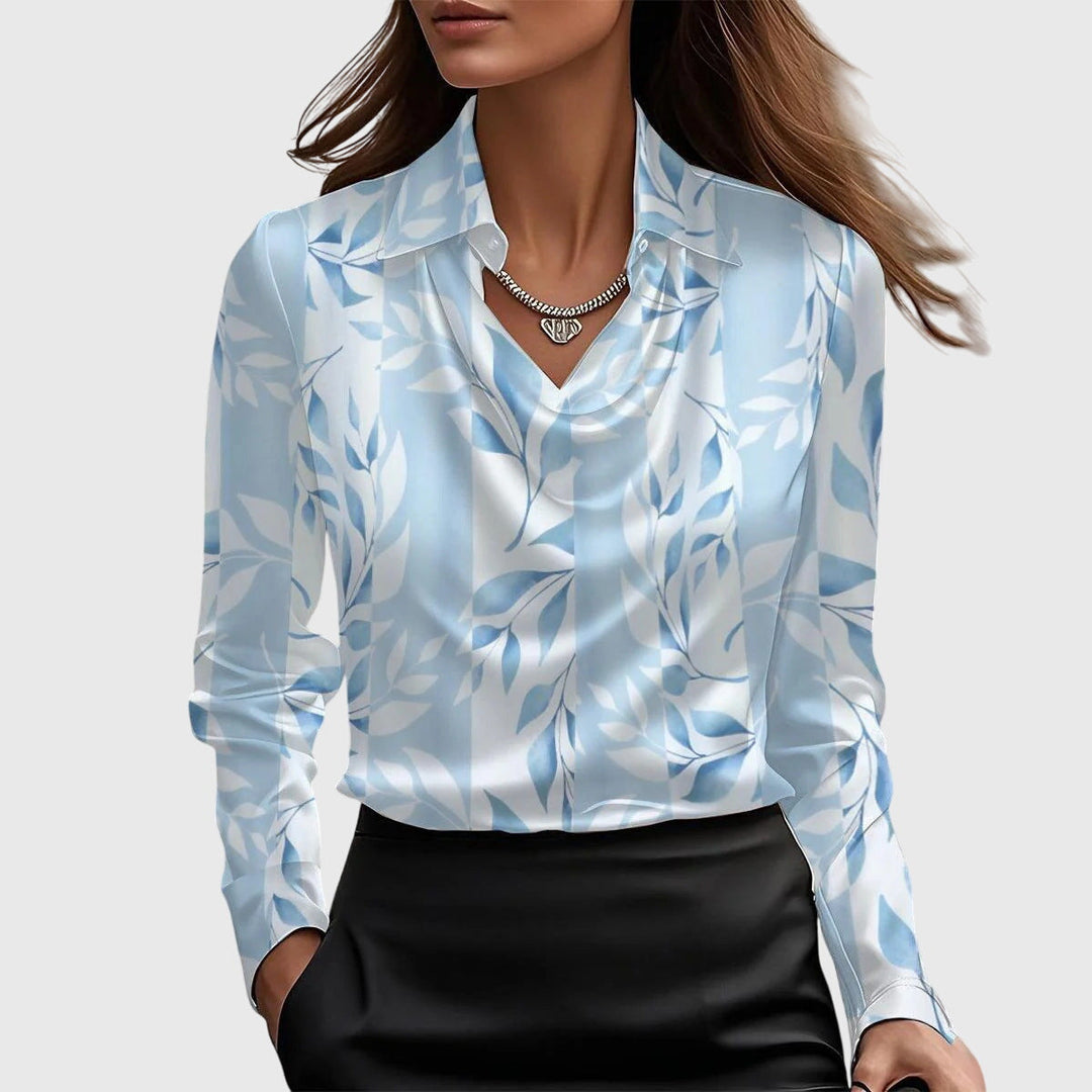 White floral women's flowy blouse, elegant and versatile with a chic pleated neckline, suitable for any occasion.