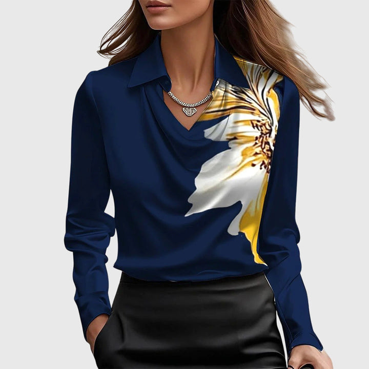 Dark blue elegant women's flowy blouse, a versatile shirt with a pleated neckline, suitable for office or casual wear.