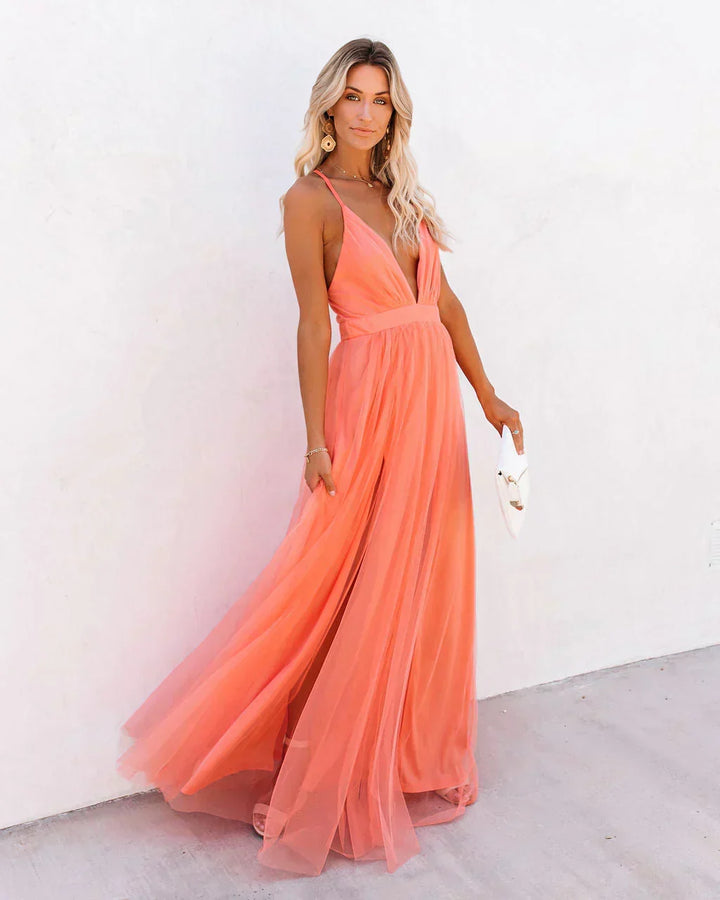 Elegant women's flowy floral maxi dress, perfect for summer events & vacation outfits.