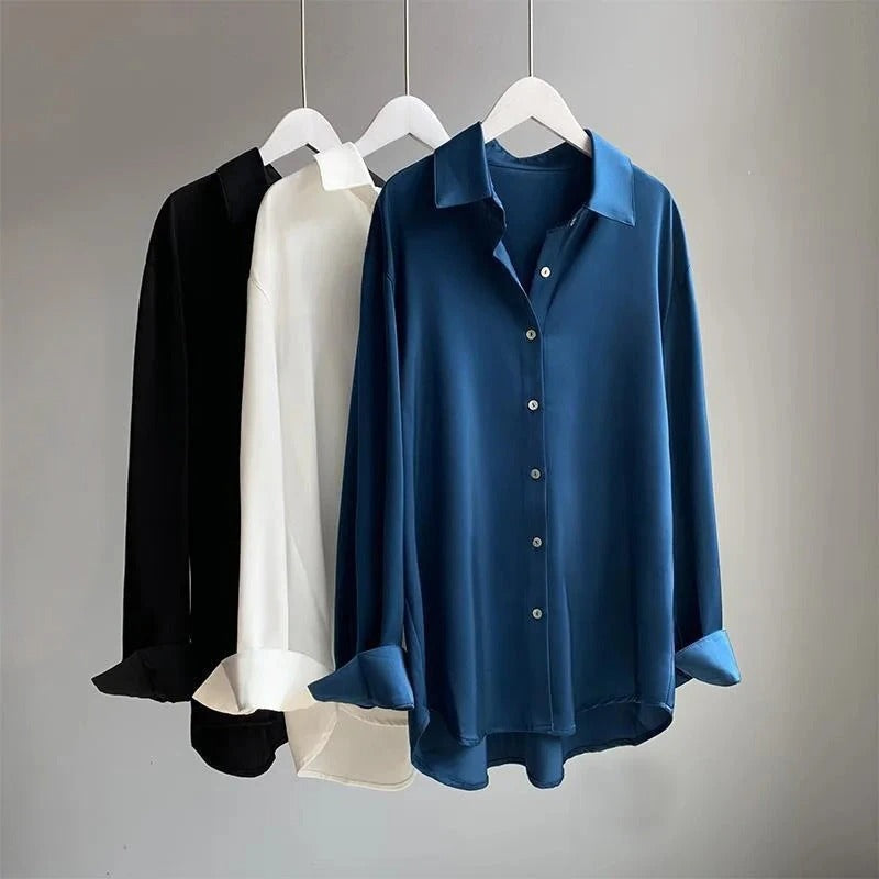 Versatile women's elegant flowy shirt, a long sleeve top for casual chic, workwear, and spring fashion.