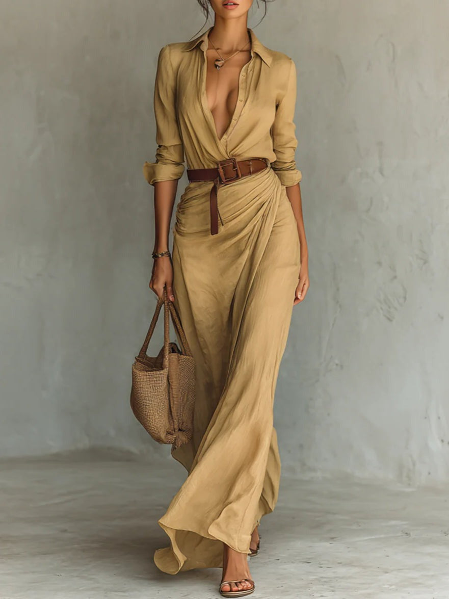 Elegant women's flowy maxi dress with a flattering v-neck and stylish belt, perfect for summer casual or office wear.