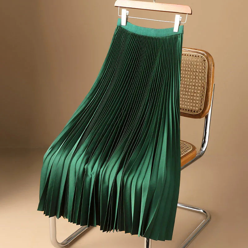 Women's elegant flowy pleated maxi skirt, a versatile classic for summer style and evening wear.