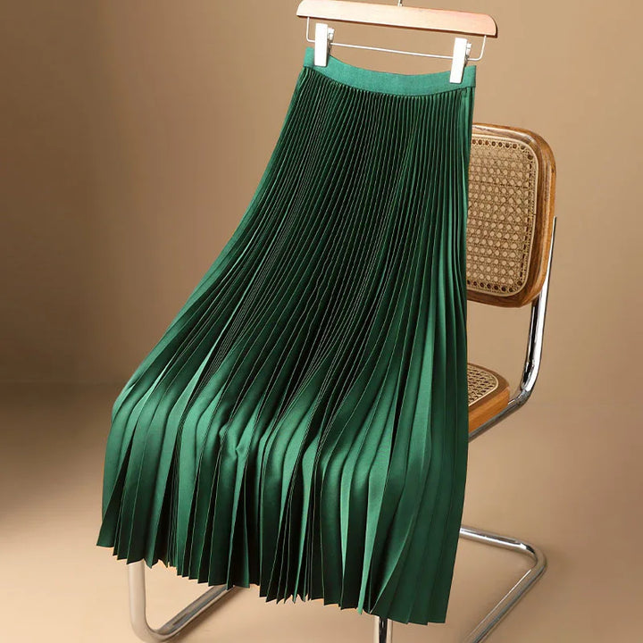 Women's elegant flowy pleated maxi skirt, a versatile classic for summer style and evening wear.