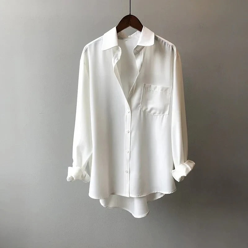 Elegant women's flowy Monaco blouse. Perfect for professional workwear or sophisticated office attire.