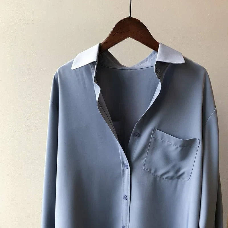 Sophisticated women's blouse, ideal for office workwear. Flowy Monaco style for a modern professional look.