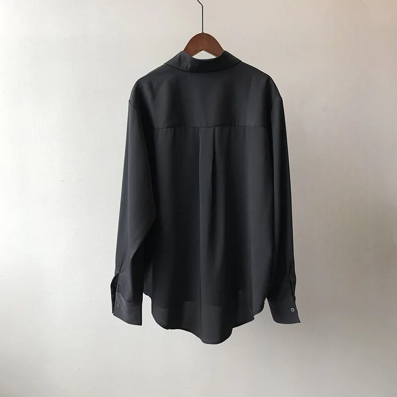 Chic women's Monaco blouse, an elegant shirt for professional settings or sophisticated casual ensembles.