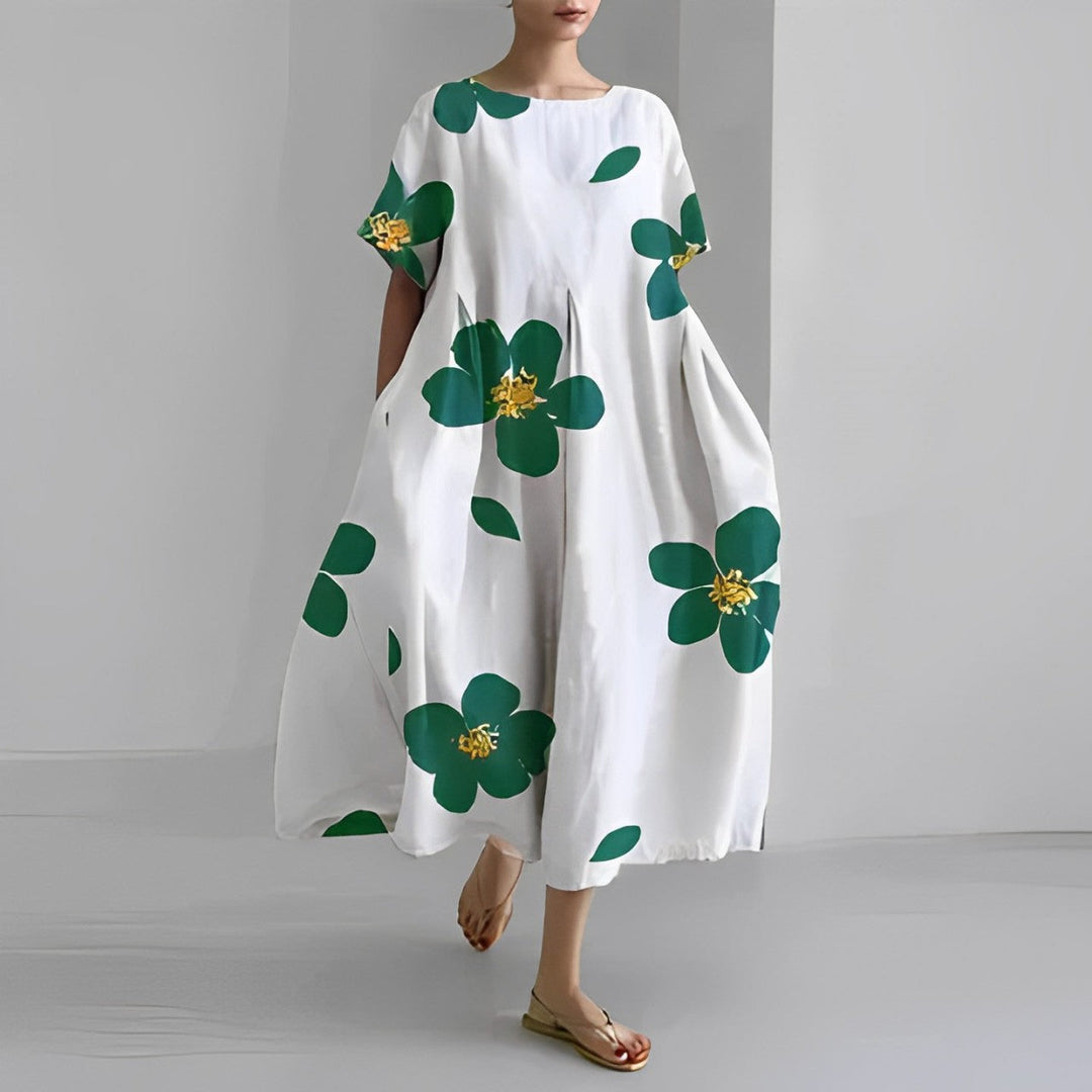 Stylish women's summer maxi dress Clara, flowy fabric with flattering waist detail for elegance