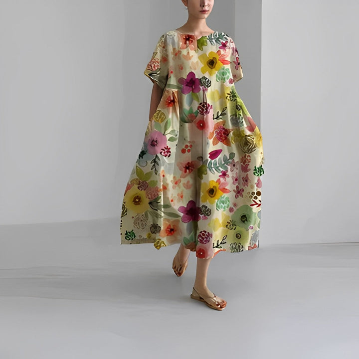 Full shot of Clara summer maxi dress, women's elegant and lightweight design with waist tie