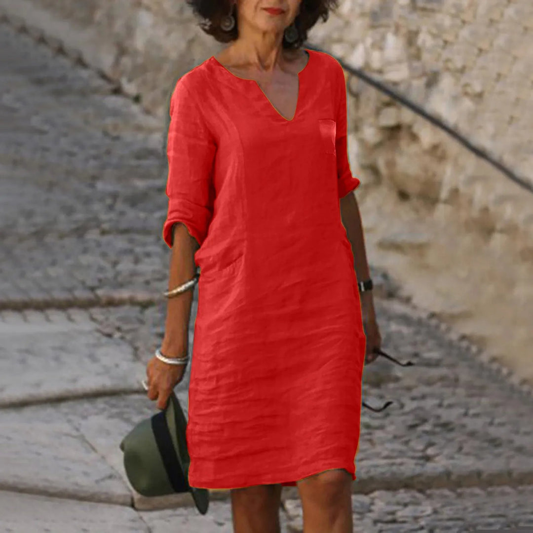 Lightweight women's flowy midi dress in a casual yet elegant summer design.