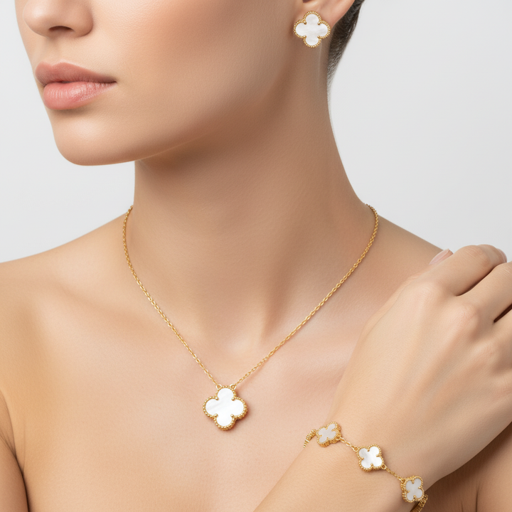 The complete women's clover necklace and earrings set, highlighting its quality and appeal as fashion jewelry