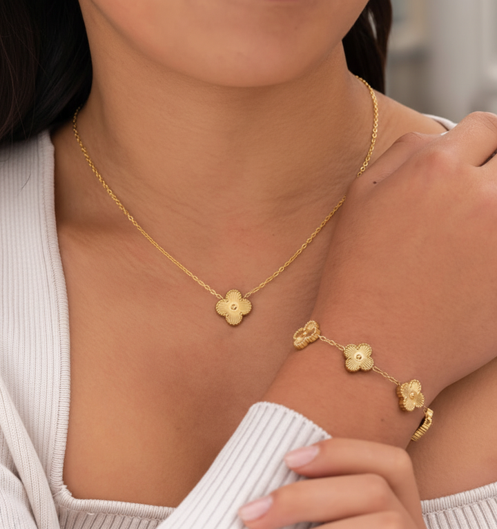 Hypoallergenic clover necklace with an adjustable chain and coordinating earrings, a charming women's jewelry set