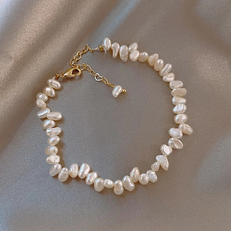 Lustrous freshwater pearl bracelet for women. Elegant classic jewelry, perfect accessory.