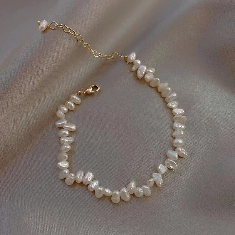 Women's elegant freshwater pearl bracelet. A timeless classic jewelry piece, enhancing any look.