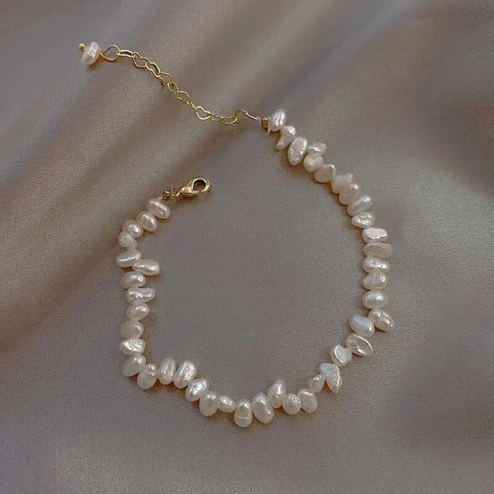 Women's elegant freshwater pearl bracelet. A timeless classic jewelry piece, enhancing any look.