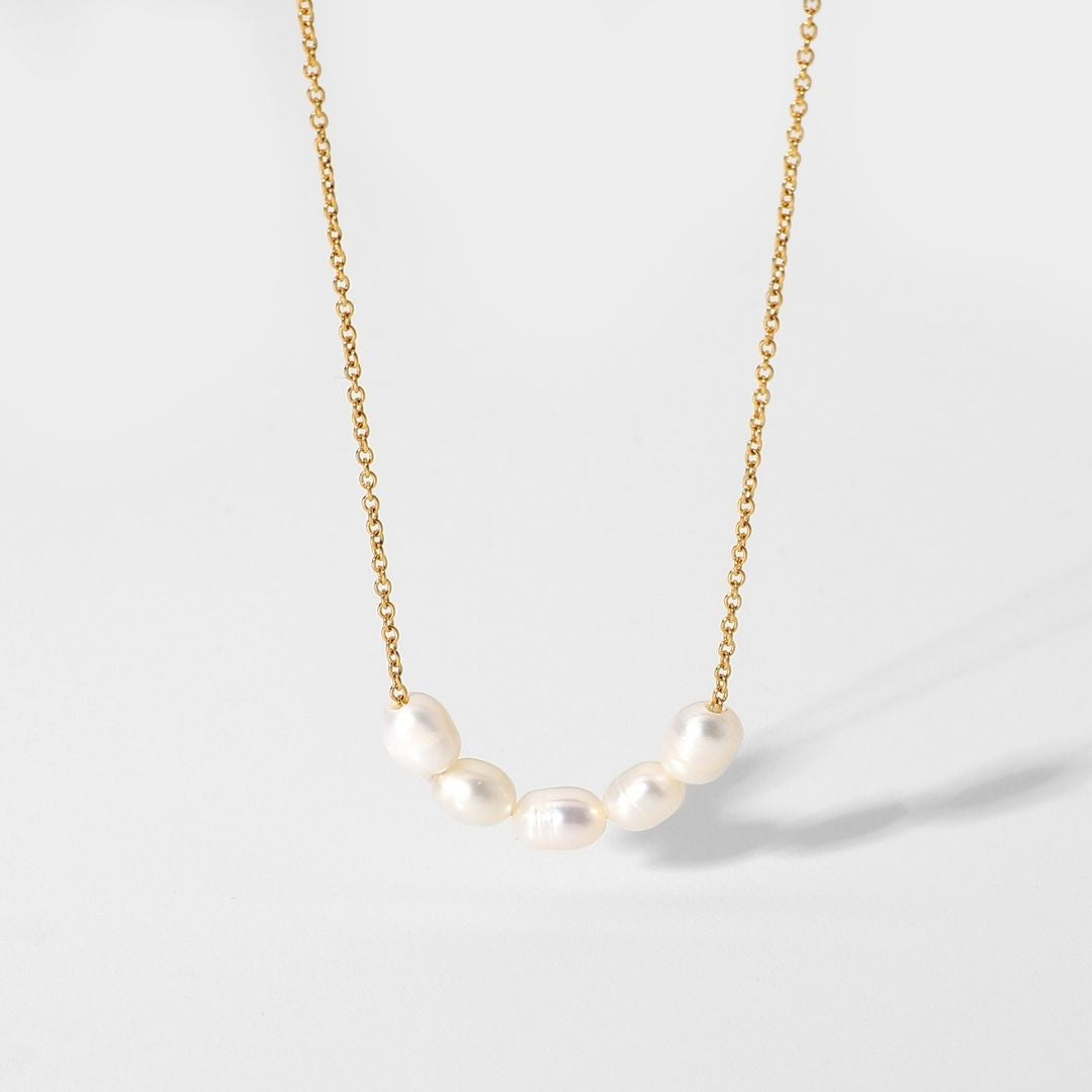 Elegant women's gold-plated freshwater pearl necklace, hypoallergenic & water resistant.