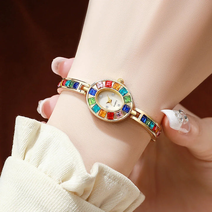 Women's elegant gemstone bracelet watch featuring an oval dial for a sophisticated look.