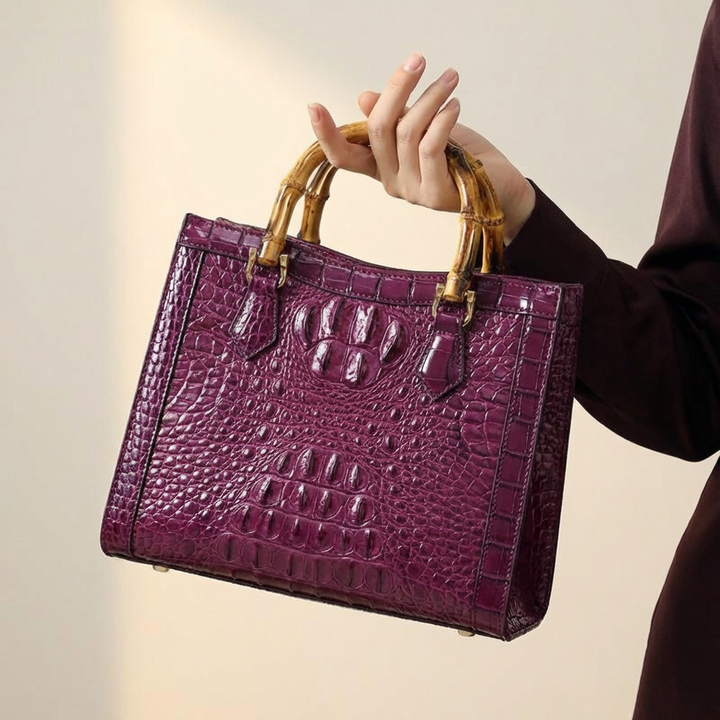 Close-up of a genuine leather women's handbag, showcasing its exquisite crocodile pattern.