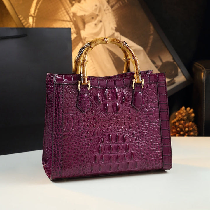 High-quality women's genuine leather handbag, showcasing its rich croc pattern and elegant design.