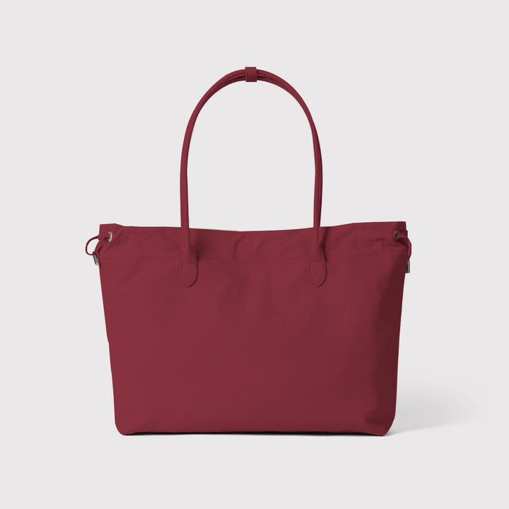 Chic minimalist leather work tote bag for women. A luxury handbag with ample space.