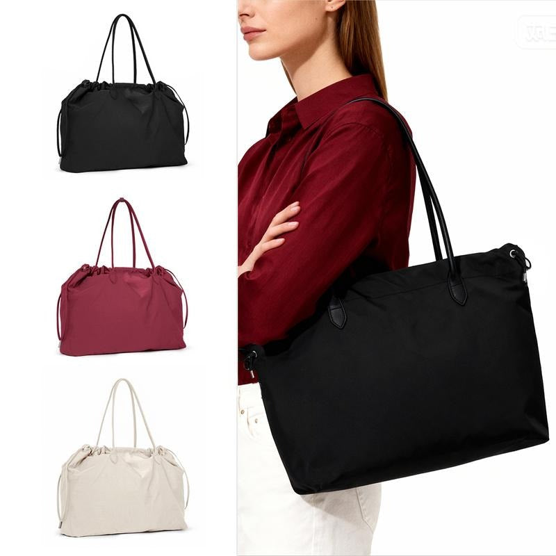 Sleek women's leather work bag. Elegant and minimalist, ideal for the professional woman.