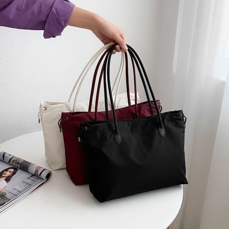 Luxury women's leather tote, elegant and spacious. The ultimate versatile everyday carry handbag.