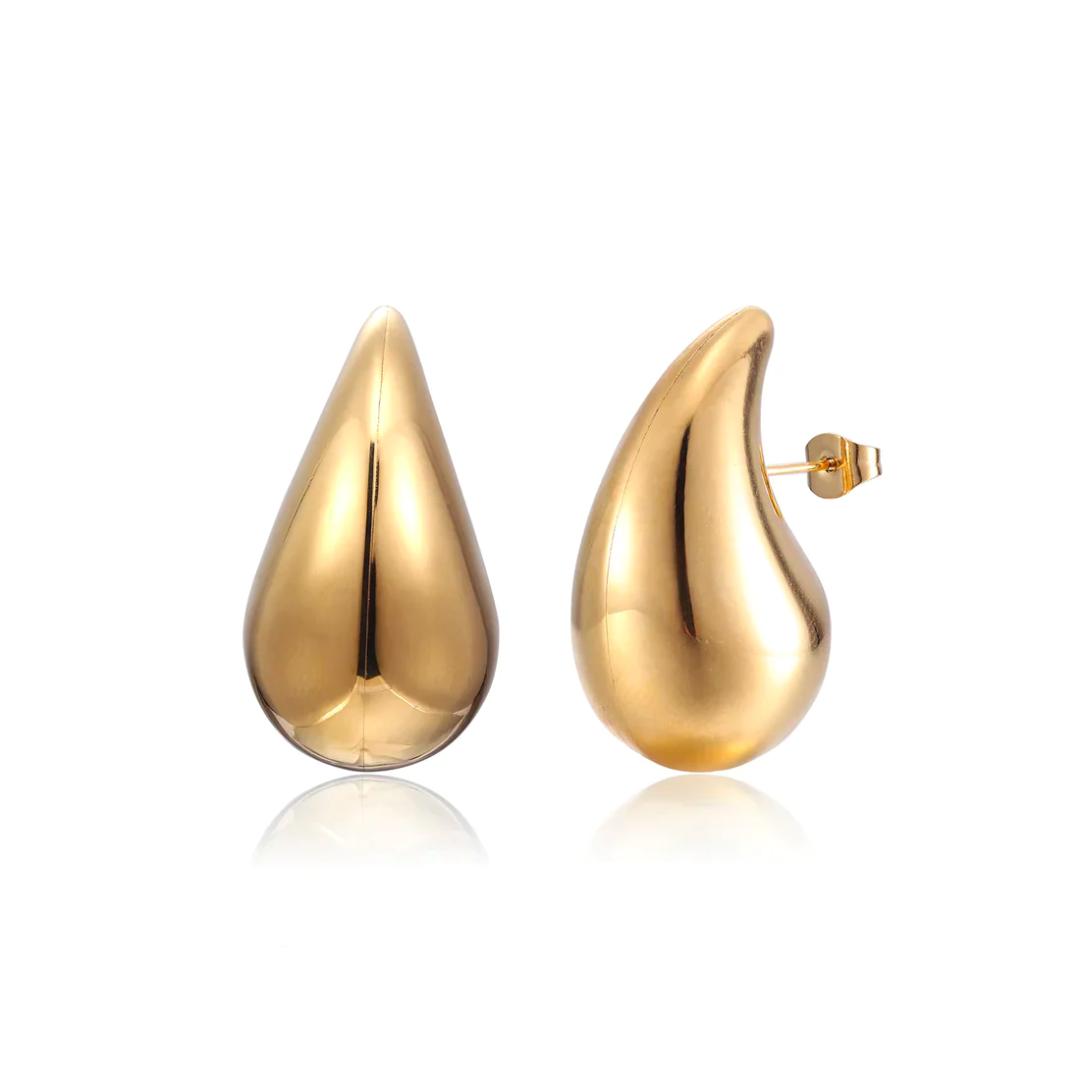 Sparkling droplet dangle earrings for women. Elegant GlimmerDrop jewelry in gold or silver finish.