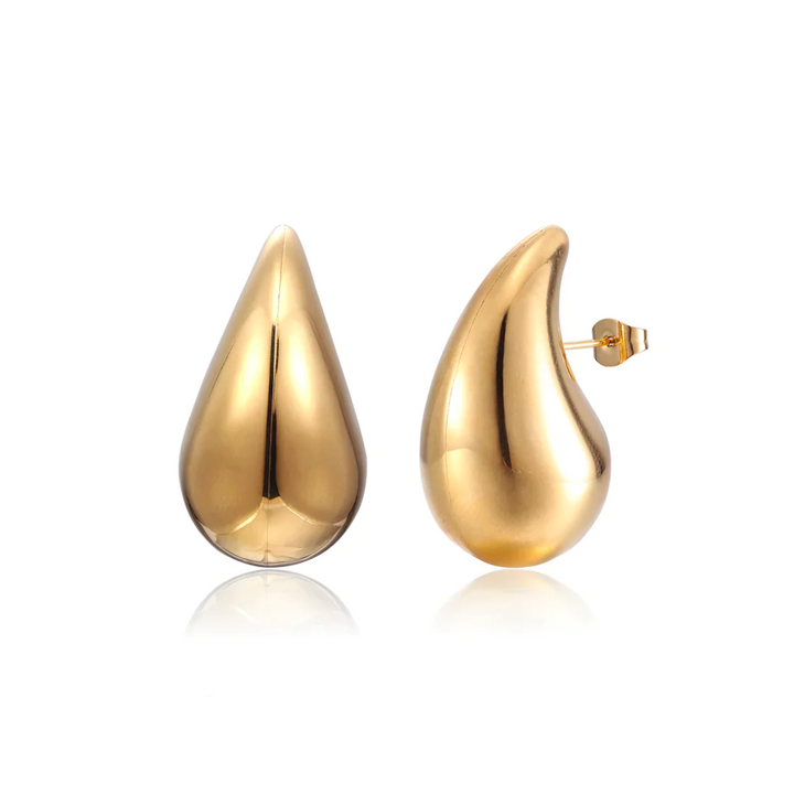 Sparkling droplet dangle earrings for women. Elegant GlimmerDrop jewelry in gold or silver finish.
