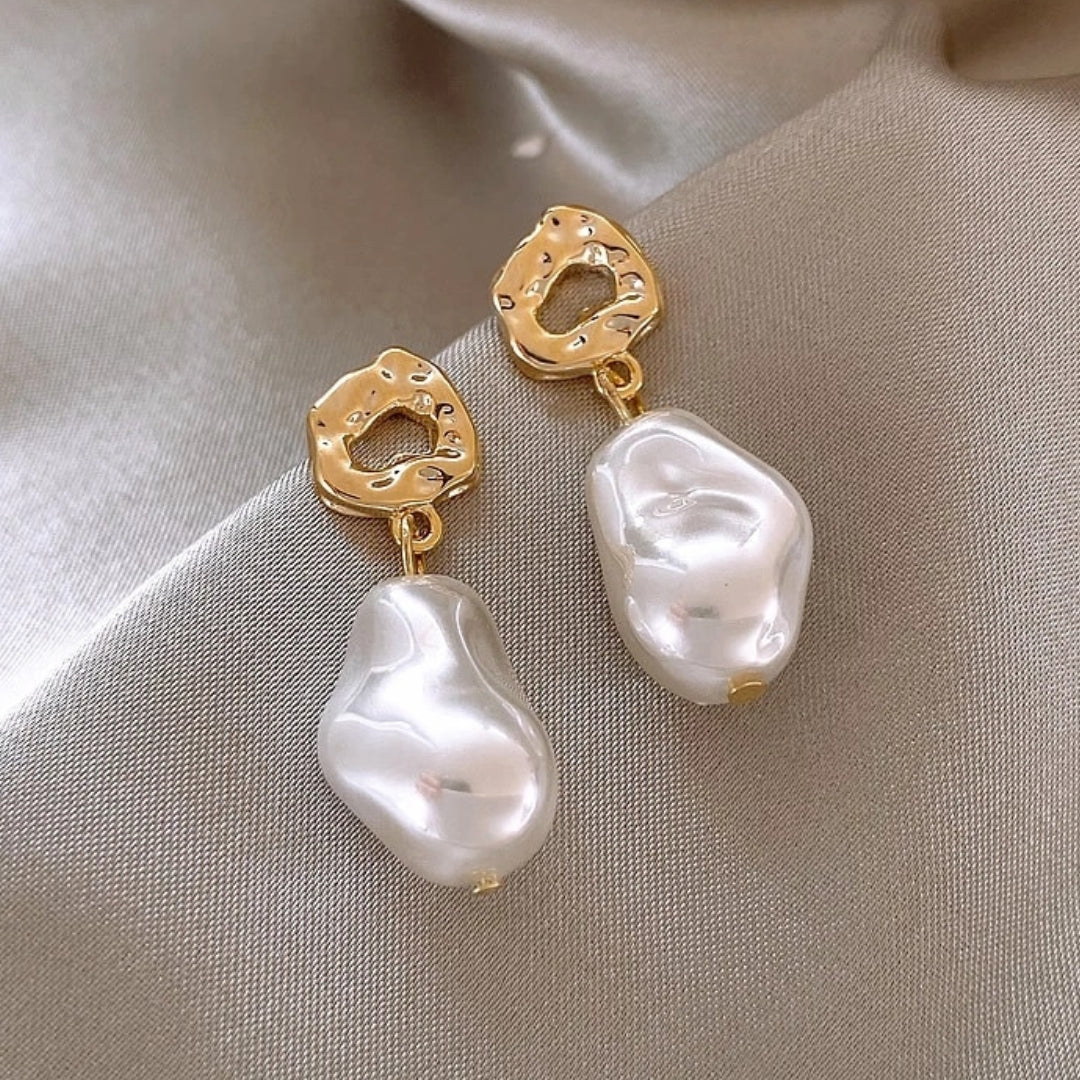 Elegant women's gold boho pearl drop earrings, a stylish fashion accessory for any occasion.