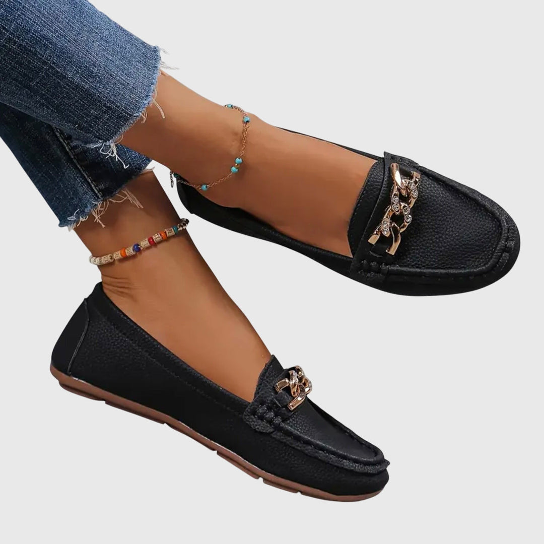 Versatile women's gold-chain wedge loafers, perfect for dress shoes or casual chic outfits.
